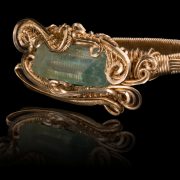 two-finger-green-stone-ring